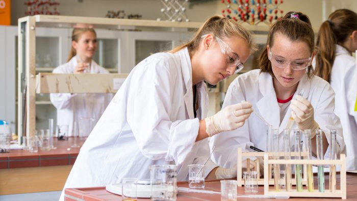 Students conducting chemical experiments at the learning research center in Berchtesgaden