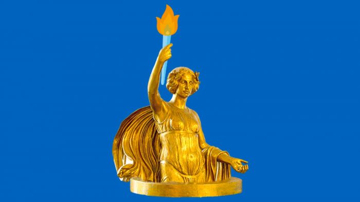 Image of a golden angel statue holding a torch