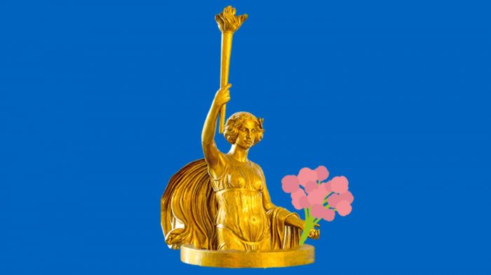 Golden angel statue holding a flower bouquet