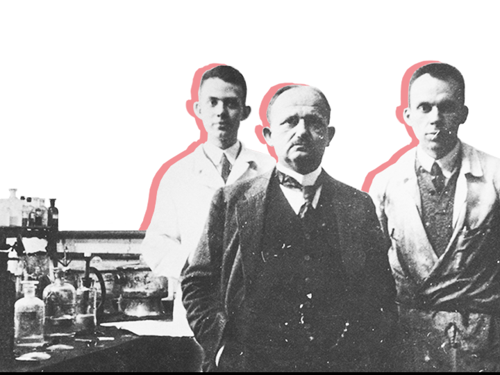 Hans Fischer and students in the laboratory